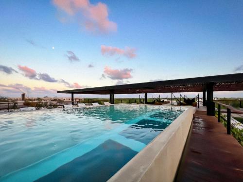 Gated 2BR apartment with rooftop pool