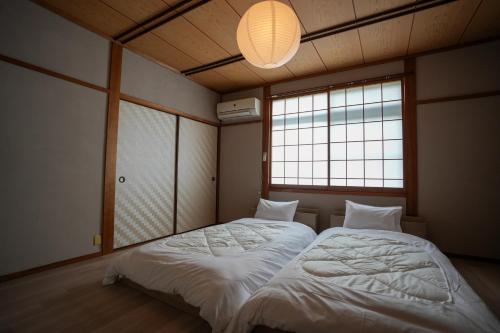 Base House Kinosaki Entire house with free shuttle & activities 送迎付きお子様無料で温泉もアクティビティも楽しめる贅沢一棟貸しステイ