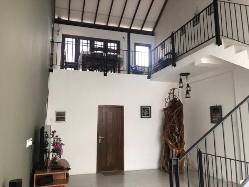 Mervins & Indus Residence - Tap to explore photos