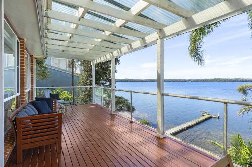 Waterfront Vista Escape with Games Room Jetty Access & Expansive Views