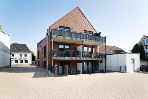 Hamptons meets Grömitz (Hamptons meets Gromitz) in 格羅米茨鎮中心