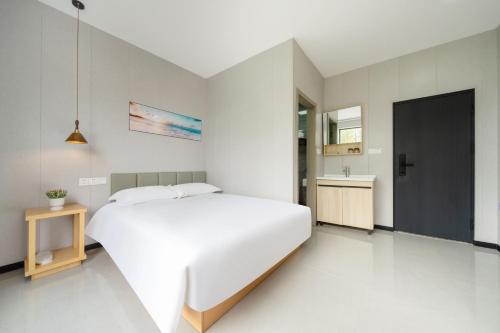 栖云居酒店 上海浦东机场店Shanghai Qiyunju Hotel - 24-hour free airport pick-up and drop-off Airport, 24-hour professional butler service, spacious room layout with great sense of space, relaxing spa massage service, Shanghai (photo 3)