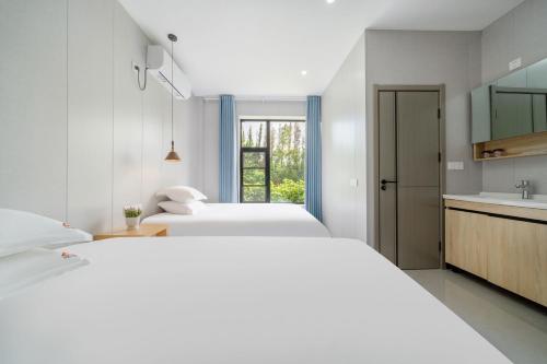 栖云居酒店 上海浦东机场店Shanghai Qiyunju Hotel - 24-hour free airport pick-up and drop-off Airport, 24-hour professional butler service, spacious room layout with great sense of space, relaxing spa massage service, Shanghai (photo 11)