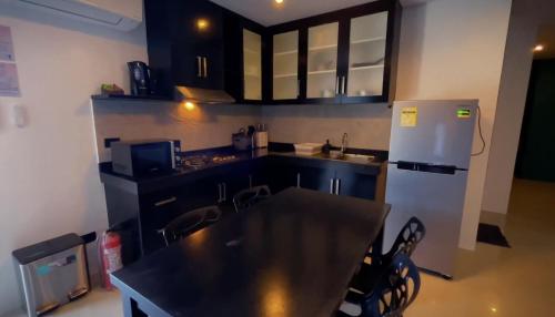 Harzel Apartelle - Suites and Serviced Apartments near Punta Bunga Beach