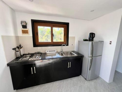 Harzel Apartelle - Suites and Serviced Apartments near Punta Bunga Beach