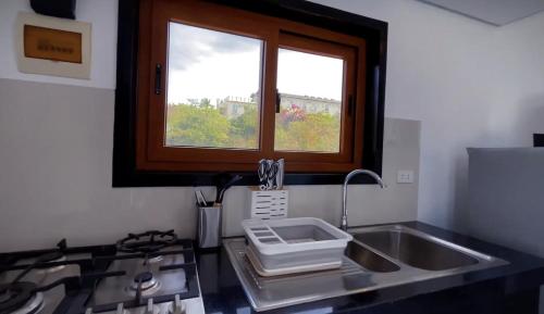 Harzel Apartelle - Suites and Serviced Apartments near Punta Bunga Beach