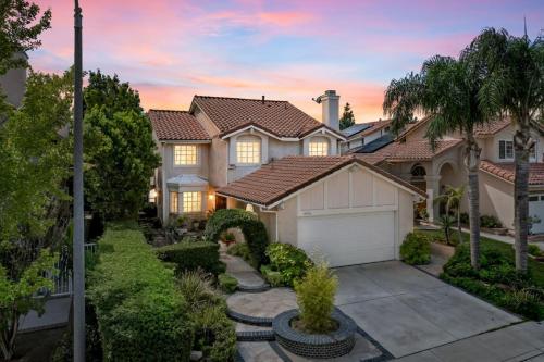 Exterior view, Porter Ranch Retreat with poll and tennis court in Santa Clarita