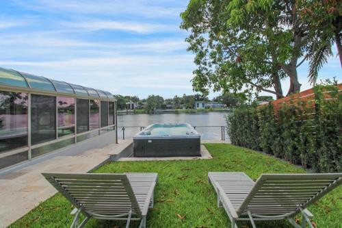 Garden, Vista Azul Lake Front Home with Hot Tub and Swim Spa, Fishing Dock, Gym, Game Room with Darts, Ping  in Miami Lakes