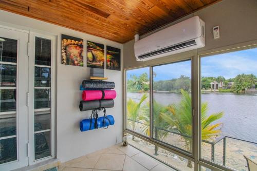Surrounding environment, Vista Azul Lake Front Home with Hot Tub and Swim Spa, Fishing Dock, Gym, Game Room with Darts, Ping  in Miami Lakes