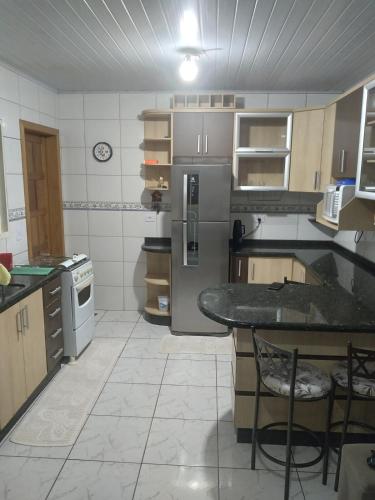 Casa em condomío, ótima localização