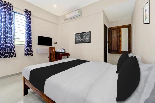 Townhouse Trivandrum Padmanabhaswamy Temple Formerly Rezt N Relaz Inn in Thiruvananthapuram