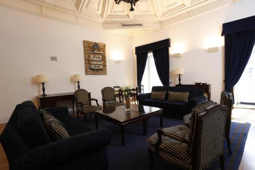 ห้องส่วนกลางสำหรับนั่งเล่น/ดูทีวี, Hotel Palácio dos Melos in วีซู