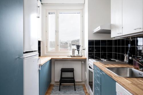 Kitchen, 2 Bedroom apartment with free parking and airconditioning in Kuopio