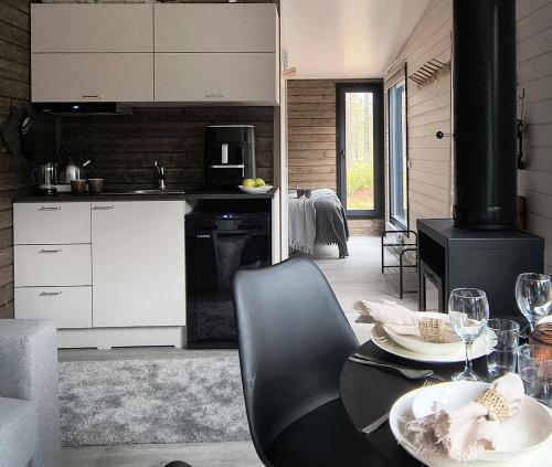 Lapelland Village - Riverside Village with a Nature View, Fireplace, Sauna, Kitchen (Lapland Landscape Cabin with Nature View, Sauna, Fireplace & Kitchen, Yllas, Akaslompolo, Riverside ) in Akaslompolo