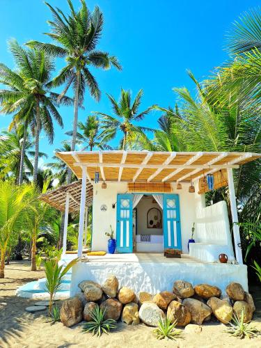 Dārzs, Coconut Garden Beach Resort in Waigete