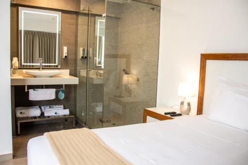 浴室, Grau Business Hotel in 皮烏拉