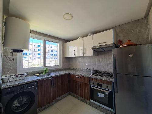 Cocina, Très Joli Appartement en résidence avec piscine (Tres Joli Appartement en residence avec piscine) in Cabo Negro