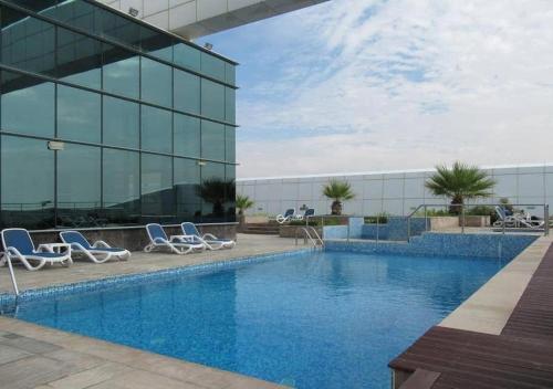 Cosmos Living Delightful Studio with Balcony, Dubaj (zdjęcie 4)