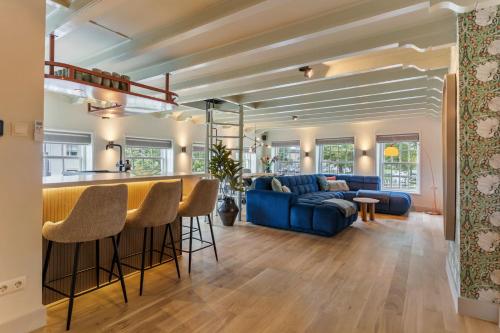 Közös társalgó / TV, Luxury Harbour Apartment with Sauna and Jacuzzi in Oude Stad