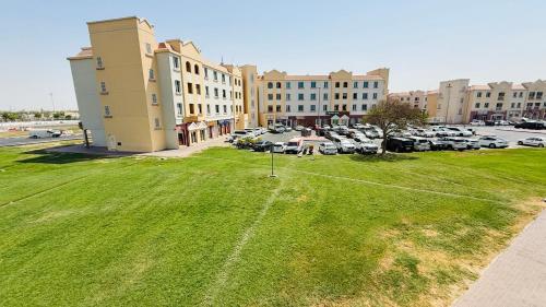 View, Z01 Furnished Studio Garden view International city in Dubai International City