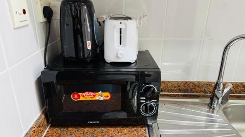 Facilities, Z01 Furnished Studio Garden view International city in Dubai International City