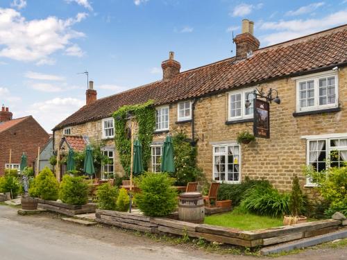 Viesnīcas āriene, Yew Tree Cottage in Burythorpe