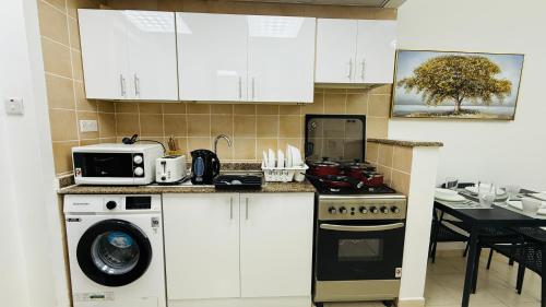 Facilities, X11 Furnished with balcony England cluster international city near Dragon Mart in Dubai International City