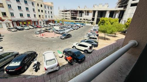 Exterior view, X11 Furnished with balcony England cluster international city near Dragon Mart in Dubai International City