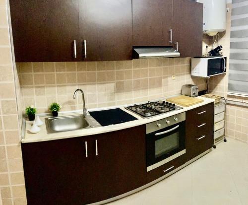 Appartement confortable 2 chambres et lumineux proche souk et plage in Hay El Farah