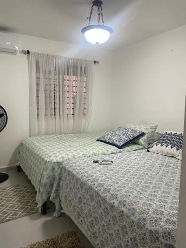 Your oasis in the city apartment with pool in Villa Mella