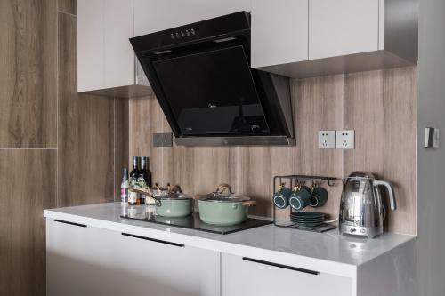 Mu En Apartment - Haiyang Road, Шанхай (фото 8)