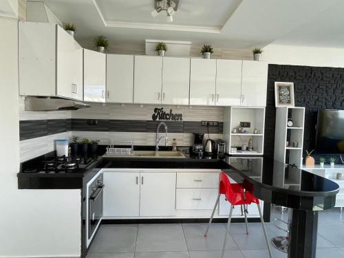 Kitchen, Luxus Duplex Arous Al Bahr in Achakkar