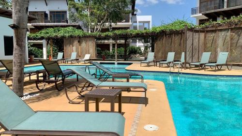 Swimming pool, Apartamento confortable cerca de la playa y aeropuerto in Guavaberry