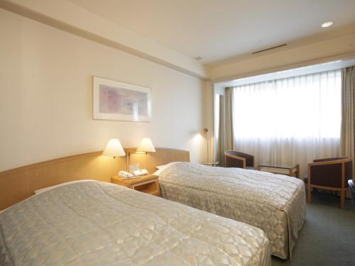 Jasmac Plaza Hotel Room Type - Twin Room - Main Building - Nonsmoking
