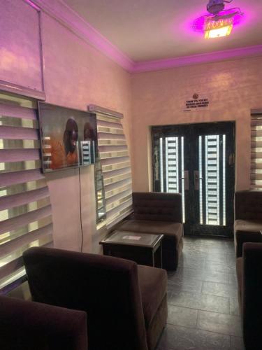 Shared lounge/TV area, Cbox Lodge & Lounge in Lagos Island
