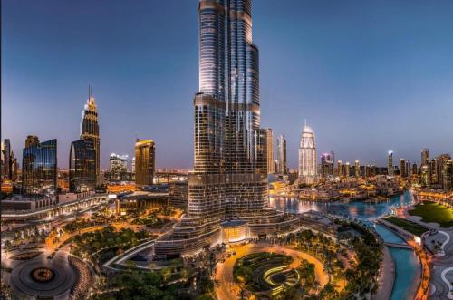 GRANDE SIGNATURE with a direct Burj Khalifa view and Private Fountain Show at high floor with DXB AIRPORT VIP Shuttle option for 8 guests, Dubai