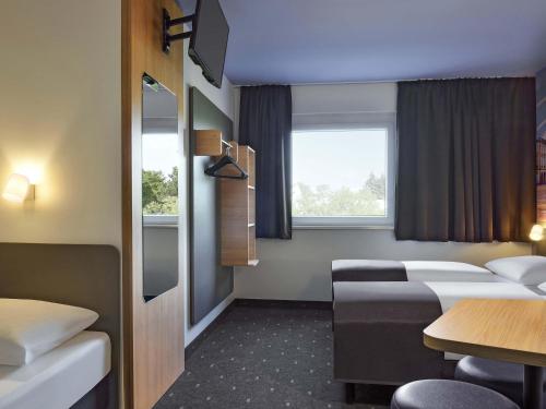 Chambre triple, 3 lits