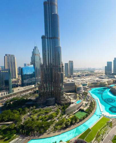 GRANDE SIGNATURE with a direct Burj Khalifa view and Private Fountain Show at high floor with DXB AIRPORT VIP Shuttle option for 6 guests, Dubai
