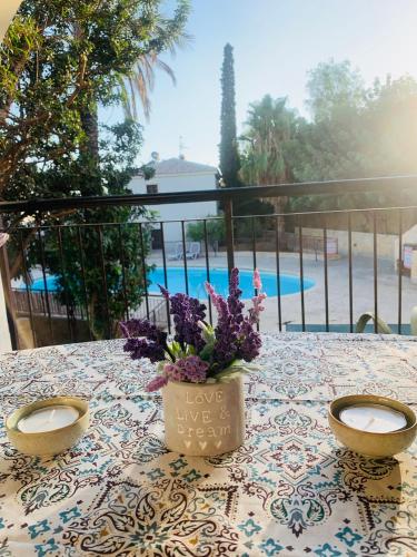 Tranquil Poolside apartment with stunning views in Mazotos