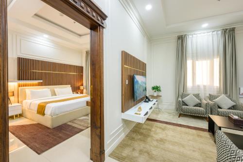 Shared lounge/TV area, Al Fakhama Plaza Hotel Apartment in Airport Zone