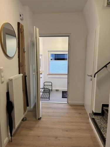 ทางเข้า, Wacholderweg, Ferienhaus in ชเนเฟอร์ดินเกน