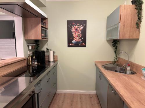 ห้องครัว, Wacholderweg, Ferienhaus in ชเนเฟอร์ดินเกน