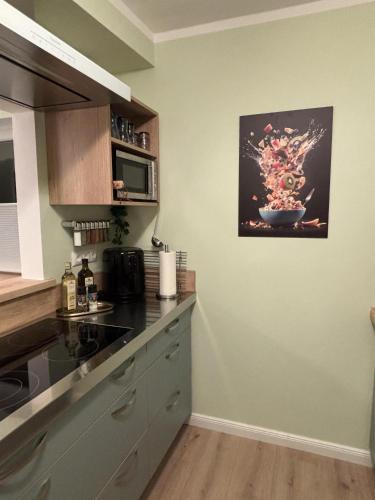 ห้องครัว, Wacholderweg, Ferienhaus in ชเนเฟอร์ดินเกน