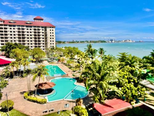 Sweet home Glory beach resort Wi-Fi Netflix|Free-p in Taman Tuah Batu