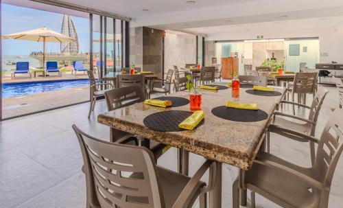 Restaurant, Delfin Beachfront Resort - Downtown Puerto Vallarta Optional All-Inclusive in Puerto Vallarta