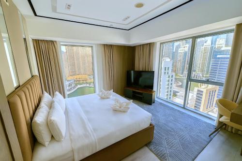 JW Marriott Stylish 1BR - Marina View - Direct Dubai Marina Mall Access - Pool & Gym - Free Parking, Dubaj