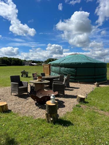 The Isla Yurt - Tap to explore photos