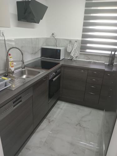 Kitchen, Grand Alba apartman Mezokovesd Zsory in Mezokovesd
