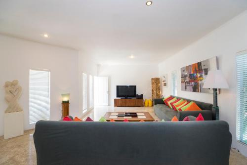 Three-Bedroom Apartment with One Bathroom room in Beach Melati Apartments