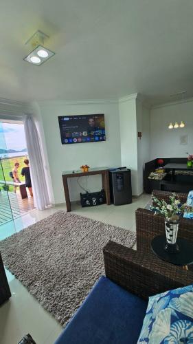 Lindo apartamento frente ao mar